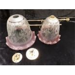 Two ruby glass shades with etched decoration brass light fittings.