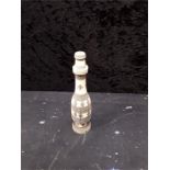 An Indian kasmir ivory turned and decorated scent bottle.