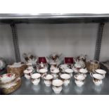 A Royal Albert tea service Old Country Roses/twelve tea cups and saucers /two large teapots/one