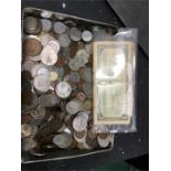 A tin of coins.