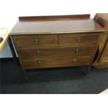 A satinwood inlaid dressing chest of 2 short and 3 long draws. Square legs.