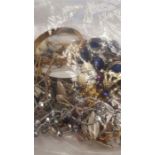 A bag of costume jewellery.