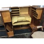 A teak 1960's wotton office desk fitted light double doors.