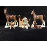 A small quantity of glazed china animals to include german horses, afghan hound etc.