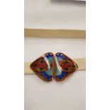 A french gilt metal enamel belt buckle.