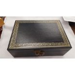 A jewellery box containing earrings brooches a B Instone style case and other items.