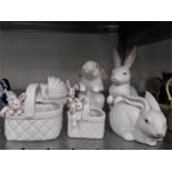 A quantity of Fitz and Floyd bunnies with a Lladro dog and other.