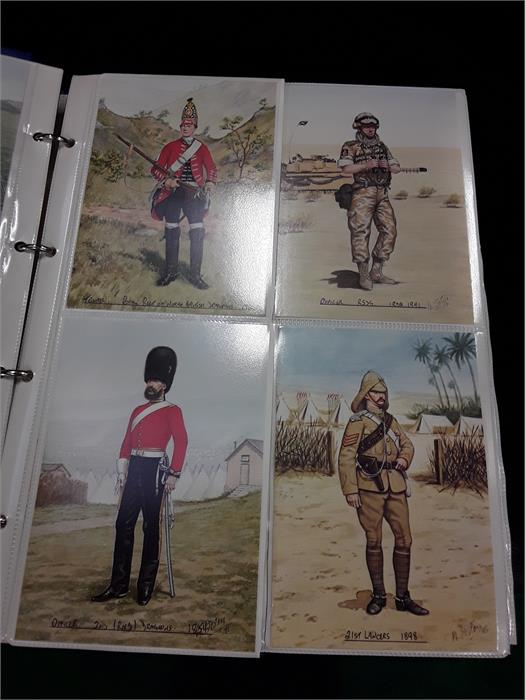 Three albums containing Military Regiment postcards.