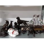 A quantity of resin animals with two china dogs.