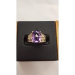 A 9 carat gold amethyst ring.