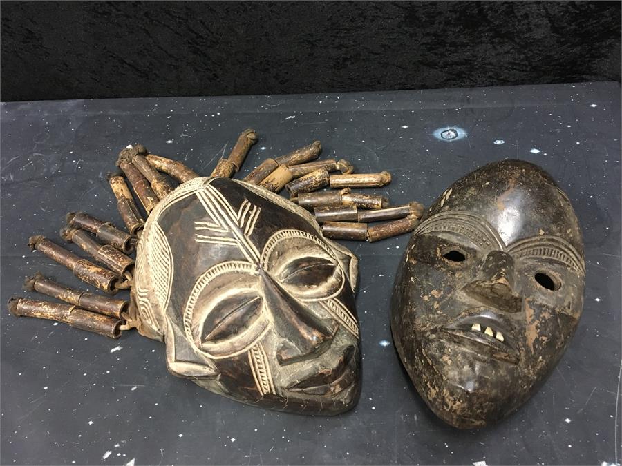 Two African Tribal Face Masks; Origin Angola and Liberia.