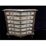 A Florentine gilt chest of drawers / chip to corner.