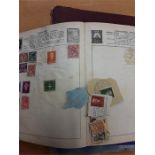 Five albums of stamps.