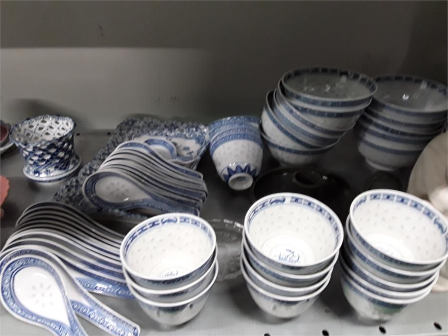 A large collection of Chinese bowls rice pattern soup set etc. with a Lladro figurine. - Image 2 of 3