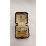 A five stone diamond (1.00CT) gold ring.