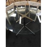 A chrome 1960's design dining table circular glass top Eames under licence for Vitra.