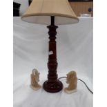 A table lamp and a pair of onyx bookends depicting horses.