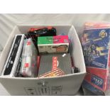 A box of games, toys and various craft items.