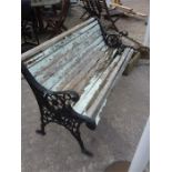 A cast iron garden bench.