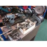 A miniature (Myford) ZVITO toymakers lathe with various chucks. Secured to a gestetners steel