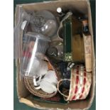 A box of household items and seven pictures.