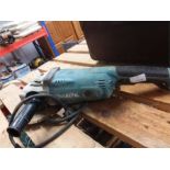 A Makita 9"angle grinder.(#).