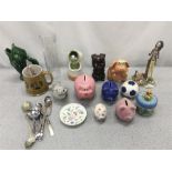 A collection of piggy banks and other various items.