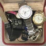 A collection of watches and jewellery.