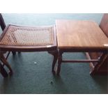A small oak table together with a mahogany rattan topped stool.