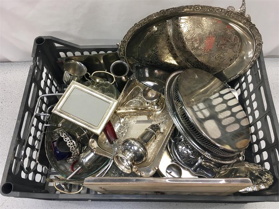 A box of silver plated tableware