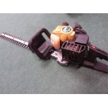 A McCulloch tivoli petrol hedge trimmer.