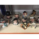 A collection of Toby jugs to include Royal Doulton.
