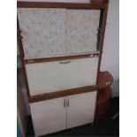 A 50's style two tone pantry cupboard.