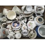 A box of royal memorabilia and other china collectables.