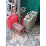 A collection of various fuel cans .