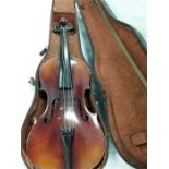 A violin in wooden case.