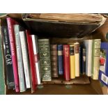 A box of various books including sports cars and novels. Also a collection of LPs.