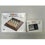 Two boxed chess computers.