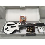 A Wii Guitar Hero and a remote control drone. Condition as found.
