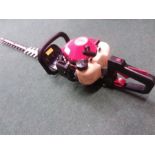 A Mitox htd600 petrol hedge trimmer.