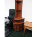 A nathan teak corner cupboard with crosshatch doors below.