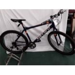 A Carrera mountain bike. 21 speed with V brakes. Some rust on cabling and wheels. (R45)