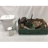A box of various vintage metal household items including a Primus stove and two enamel containers.