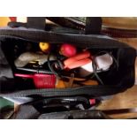 An electricians tool bag with hand tools.(53).