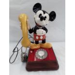 A vintage Mickey Mouse telephone.