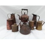 Various brass and copper jugs and kettles.