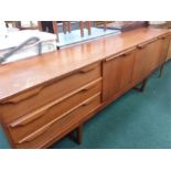 A teak retro sideboard.