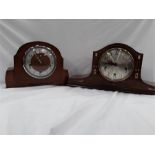 Two wooden mantle clocks.