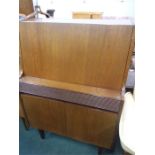 A teak single drawer bureau.