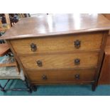 An oak chest of three drawers.